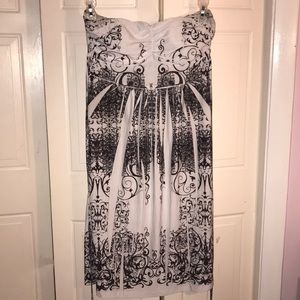 Black and white strapless mini dress.